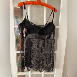 NWT black lace teddy. Size 16/18 adjustable straps. Hook and eye closure.